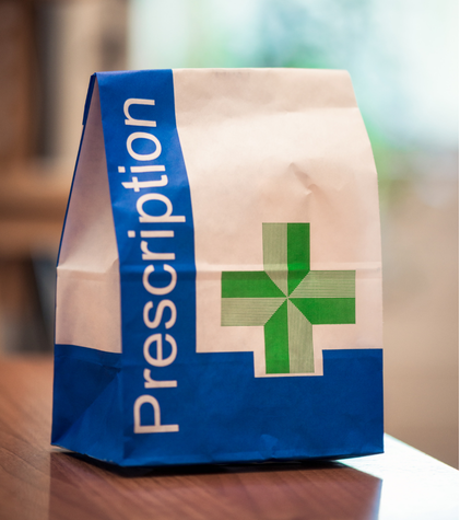 NHS prescription bag on counter